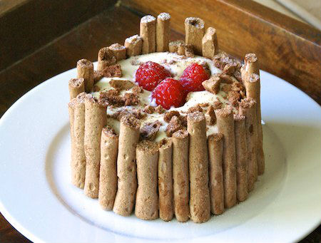 Chocolate Meringue Mousse Cake - This extravaganza of a cake cake is a feast for the eyes as well as for the mouth. Rich chocolate cake topped with velvety chocolate mousse surrounded by homemade meringues. All topped off by a heavy sprinkling of shaved chocolate, a circle of strawberries and then the whole thing; mousse, cake, strawberries, meringue and even the plate is drizzled with a chocolate web. A true party piece and an indulgence that can’t be resisted.