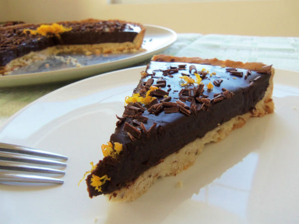 Chocolate Tart - This tart is a really rich delicious finish to a meal. With bittersweet chocolate crust and silky delicious center it’s a favorite for people of any age, particularly adults for its more bitter use of chocolate and cocoa.