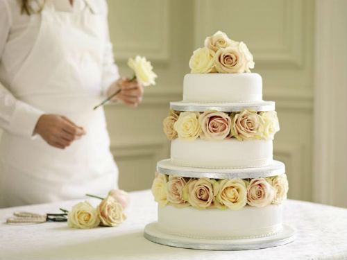 Fresh Flowers And Ruffles Wedding Cake